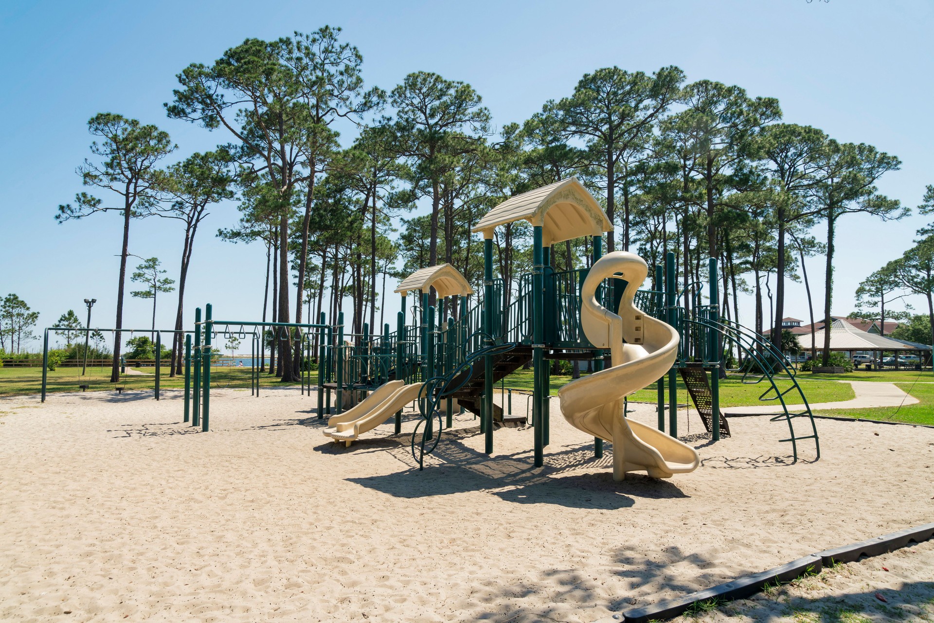 Destin, Florida- Playground on a sand with slides, monkey bars, and swings